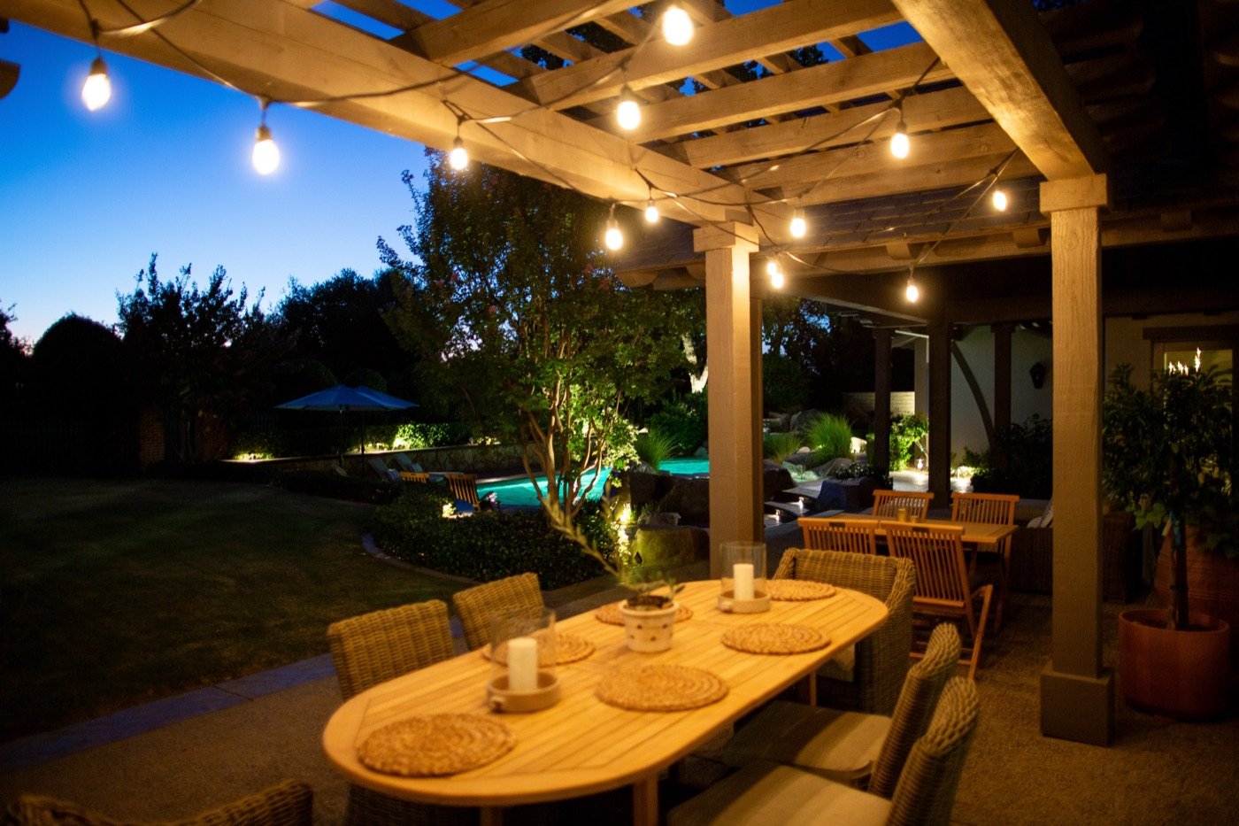 Outdoor dining patio with lighting