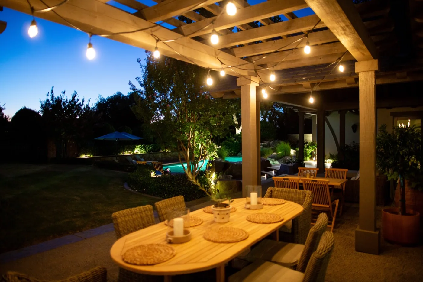 Outdoor dining patio with lighting