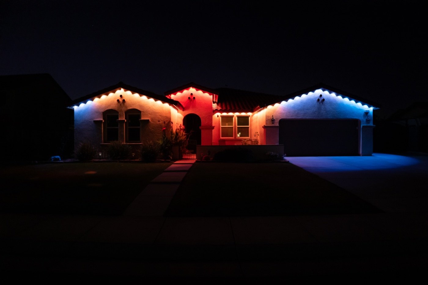 Home with permanent color exterior lighting